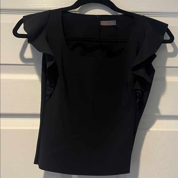 Commando Tops - NWOT Commando Black top with ruffles size XS